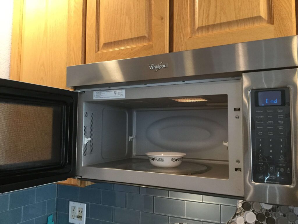 When the timer is done, your microwave should be all steamy inside. Use a clean wash cloth and wipe out the entire microwave.