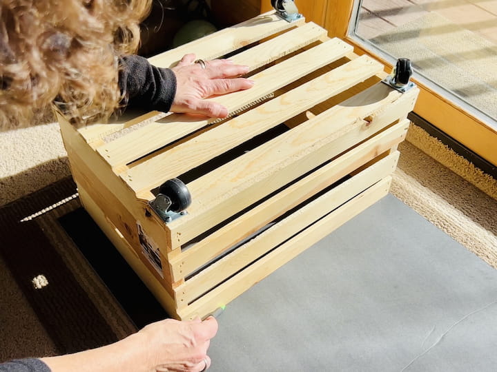 Measure and Trace: Place your wooden crate upside down on a flat surface. Use a ruler or measuring tape to determine the dimensions of the top surface of the crate. Draw a line to trace the size of the top surface onto the poster board. 