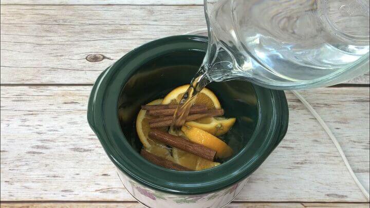 Before washing your dishes, flip one of the dirty glasses upside down and add a cup of vinegar to it.