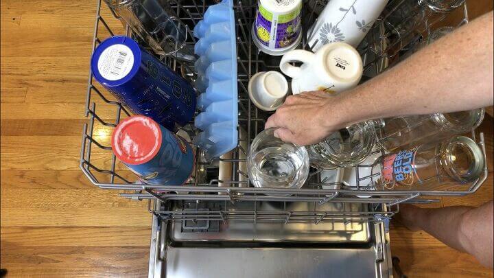 Place it on the top rack. Close and run your dishwasher as usual. Your dishwasher will come out smelling clean and vinegar also acts as a spot remover.