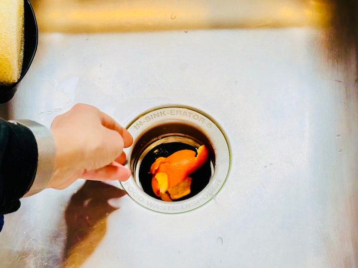 Adding orange peels to garbage disposal