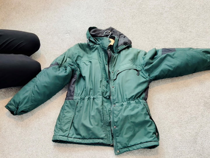 Now if you live in an area that has snow pants no problem. Put those on the bottom of a hanger and then place that inside the coat as well. Now your entire outfit is complete.
