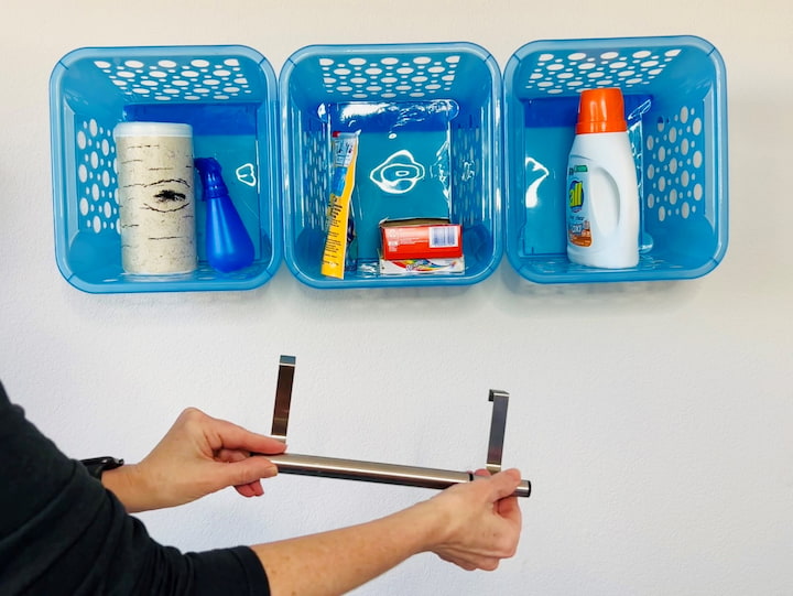 5. Bonus small laundry room hack, add a hanging cabinet rack on your shelf.