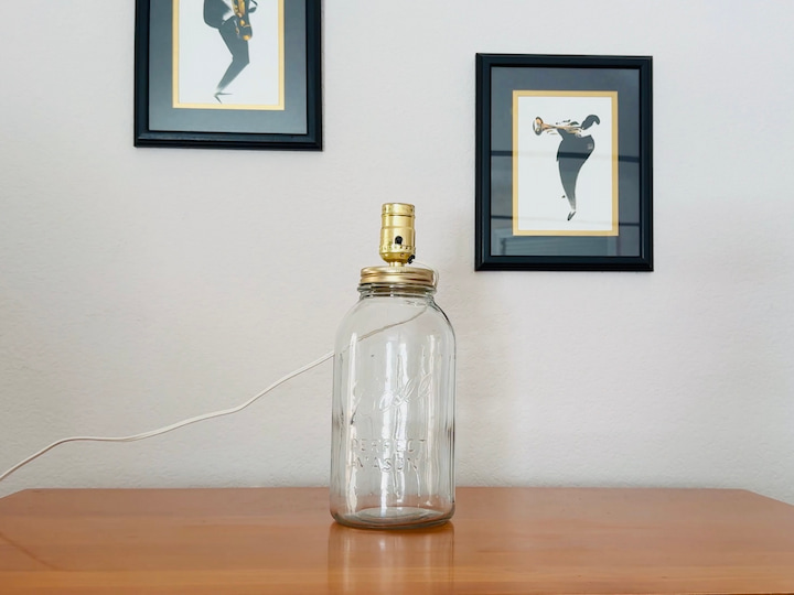 For this project, I started with a very large mason jar. I purchased a light bulb kit that came with a cord and then I attached it to the mason jar lid. Then I placed the mason jar lid back on top of the mason jar.