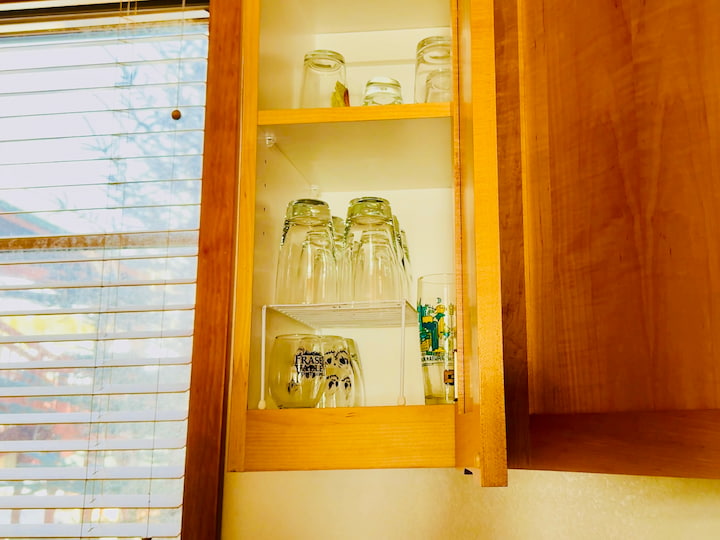 organized glasses with bonus shelf